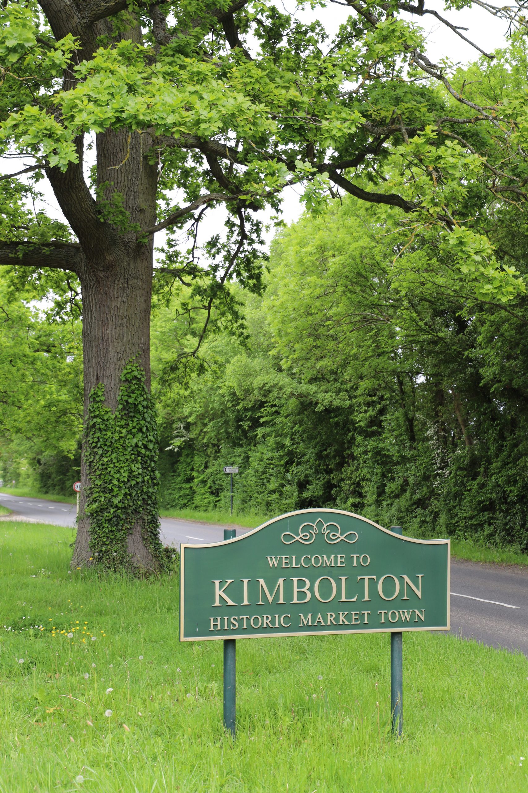 Photo of Kimbolton Sign, which is located at each of end of the village.